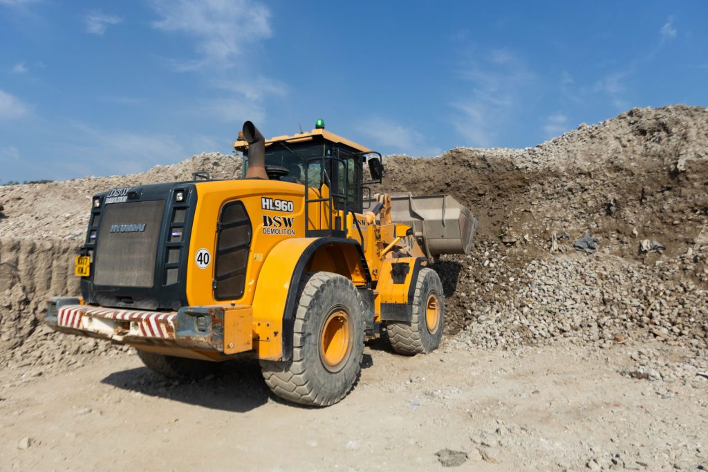 _33A7356 Aggregates in Cornwall being scooped up by a Hyundai excavator