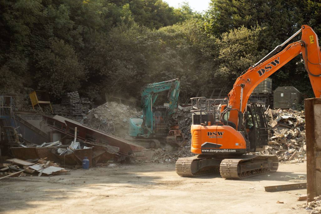 _33A7520 Excavators managing skip hire waste at DSW's yard in St Dennis, Cornwall